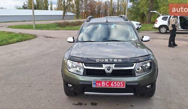 Дачия Duster 2013 в Новоархангельске на Automoto.ua Зеленый Дачия Duster, объемом двигателя 1.5 л и пробегом 198 тыс. км за 10500 $, фото 34 на Automoto.ua