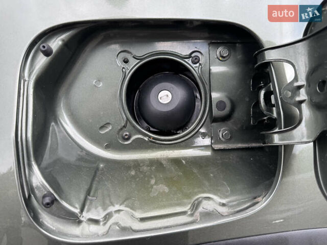 Зелений Дачія Duster, об'ємом двигуна 1.5 л та пробігом 195 тис. км за 10300 $, фото 13 на Automoto.ua