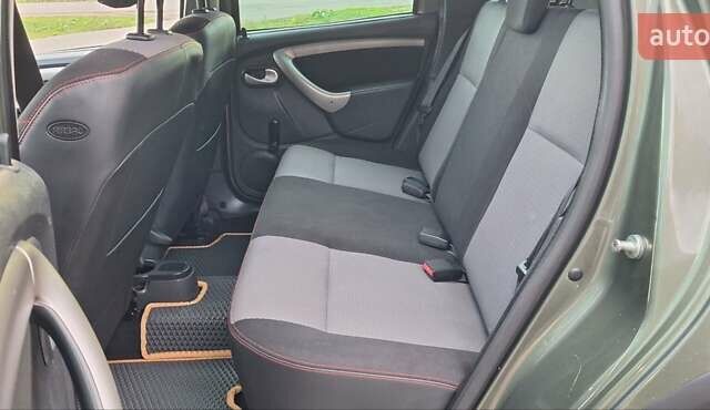 Дачия Duster 2013 в Новоархангельске на Automoto.ua Зеленый Дачия Duster, объемом двигателя 1.5 л и пробегом 198 тыс. км за 10500 $, фото 55 на Automoto.ua