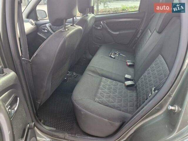 Зелений Дачія Duster, об'ємом двигуна 1.5 л та пробігом 168 тис. км за 10499 $, фото 14 на Automoto.ua