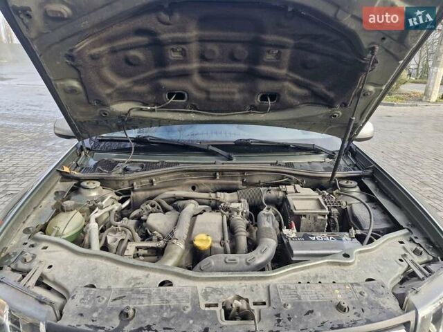 Зелений Дачія Duster, об'ємом двигуна 1.5 л та пробігом 168 тис. км за 10499 $, фото 9 на Automoto.ua