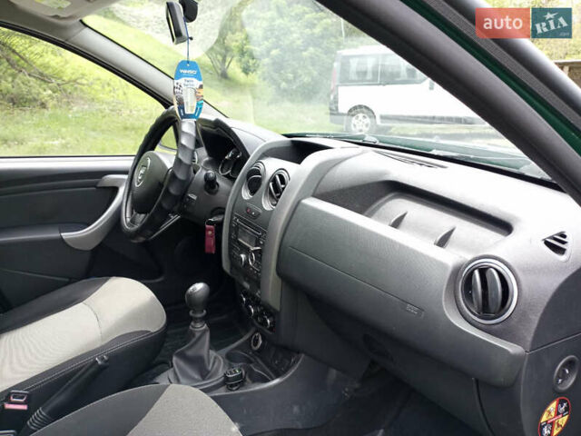 Зеленый Дачия Duster, объемом двигателя 1.5 л и пробегом 194 тыс. км за 9300 $, фото 12 на Automoto.ua