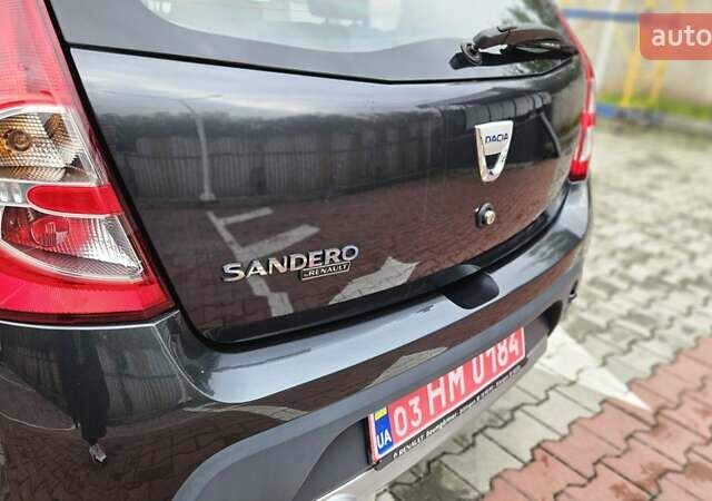 Черный Дачия Sandero StepWay, объемом двигателя 1.6 л и пробегом 125 тыс. км за 7350 $, фото 20 на Automoto.ua