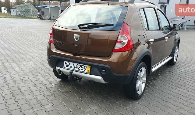 Коричневый Дачия Sandero StepWay, объемом двигателя 1.6 л и пробегом 164 тыс. км за 6850 $, фото 11 на Automoto.ua