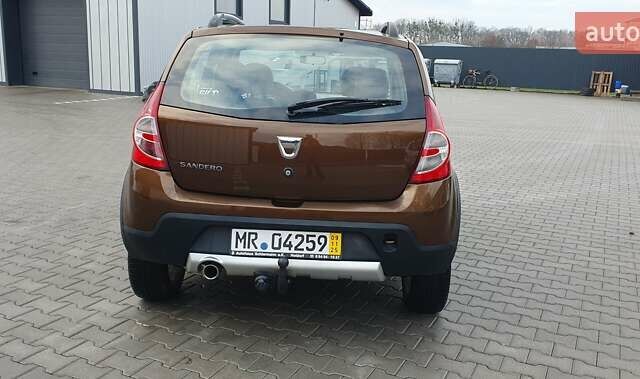 Коричневый Дачия Sandero StepWay, объемом двигателя 1.6 л и пробегом 164 тыс. км за 6850 $, фото 9 на Automoto.ua