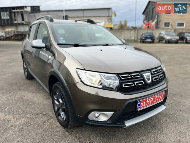 Коричневый Дачия Sandero StepWay, объемом двигателя 0.9 л и пробегом 137 тыс. км за 8699 $, фото 18 на Automoto.ua