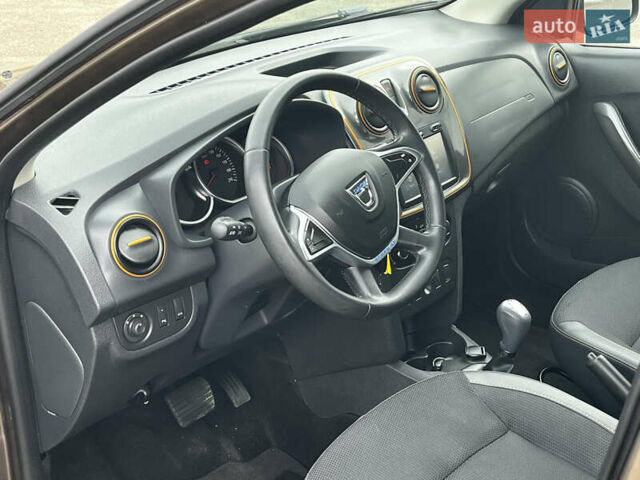 Коричневый Дачия Sandero StepWay, объемом двигателя 0.9 л и пробегом 137 тыс. км за 8699 $, фото 21 на Automoto.ua