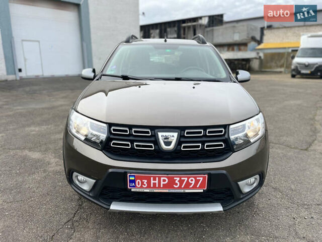 Коричневый Дачия Sandero StepWay, объемом двигателя 0.9 л и пробегом 137 тыс. км за 8699 $, фото 14 на Automoto.ua