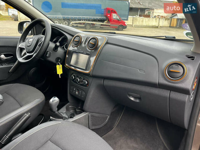 Коричневый Дачия Sandero StepWay, объемом двигателя 0.9 л и пробегом 137 тыс. км за 8699 $, фото 32 на Automoto.ua