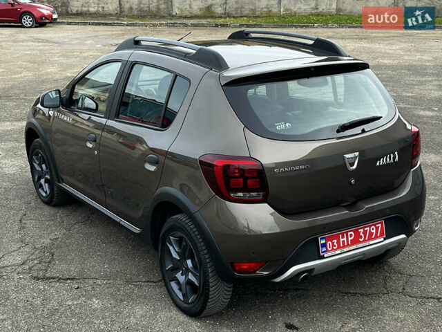 Коричневый Дачия Sandero StepWay, объемом двигателя 0.9 л и пробегом 137 тыс. км за 8699 $, фото 11 на Automoto.ua