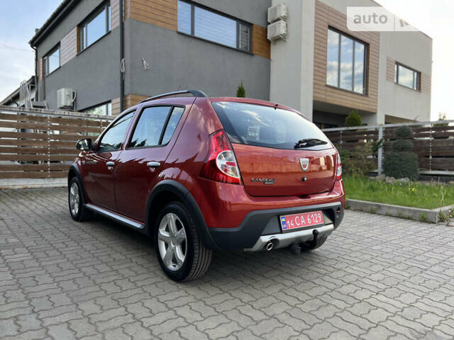 Красный Дачия Sandero StepWay, объемом двигателя 1.6 л и пробегом 145 тыс. км за 6549 $, фото 32 на Automoto.ua