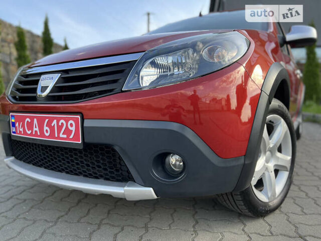 Красный Дачия Sandero StepWay, объемом двигателя 1.6 л и пробегом 145 тыс. км за 6549 $, фото 5 на Automoto.ua