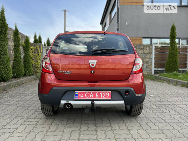 Красный Дачия Sandero StepWay, объемом двигателя 1.6 л и пробегом 145 тыс. км за 6549 $, фото 28 на Automoto.ua