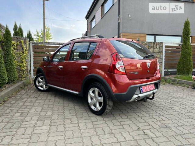 Красный Дачия Sandero StepWay, объемом двигателя 1.6 л и пробегом 145 тыс. км за 6549 $, фото 35 на Automoto.ua