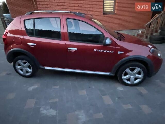 Красный Дачия Sandero StepWay, объемом двигателя 1.6 л и пробегом 195 тыс. км за 6299 $, фото 1 на Automoto.ua
