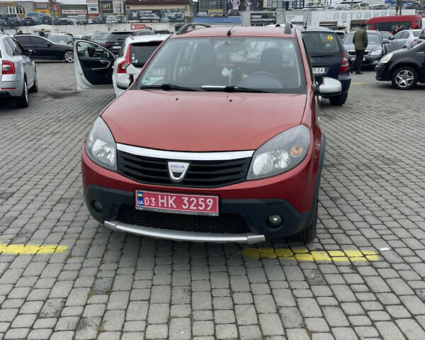 Красный Дачия Sandero StepWay, объемом двигателя 1.6 л и пробегом 211 тыс. км за 5600 $, фото 4 на Automoto.ua