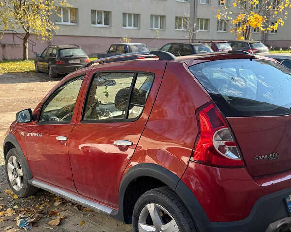 Красный Дачия Sandero StepWay, объемом двигателя 1.6 л и пробегом 220 тыс. км за 6000 $, фото 7 на Automoto.ua