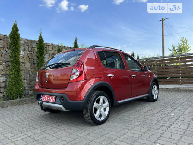 Красный Дачия Sandero StepWay, объемом двигателя 1.6 л и пробегом 145 тыс. км за 6549 $, фото 39 на Automoto.ua