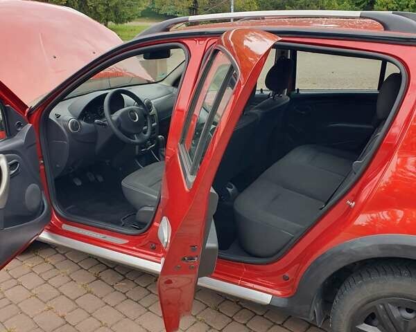 Красный Дачия Sandero StepWay, объемом двигателя 1.5 л и пробегом 208 тыс. км за 6999 $, фото 13 на Automoto.ua