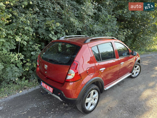 Красный Дачия Sandero StepWay, объемом двигателя 1.6 л и пробегом 220 тыс. км за 6999 $, фото 4 на Automoto.ua