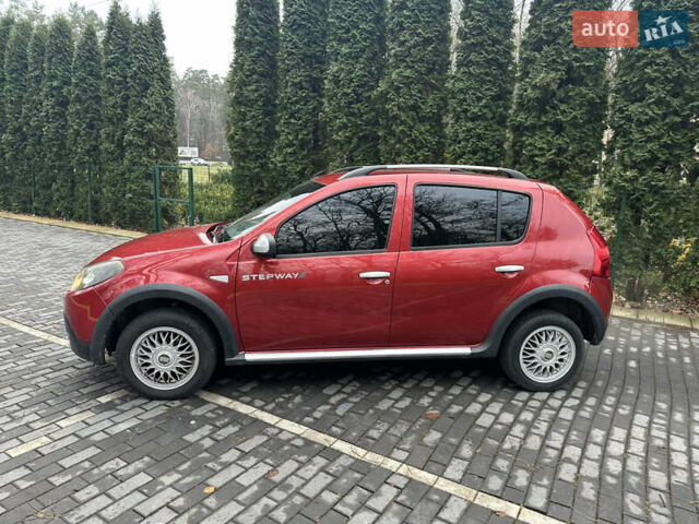 Красный Дачия Sandero StepWay, объемом двигателя 1.6 л и пробегом 166 тыс. км за 5699 $, фото 1 на Automoto.ua