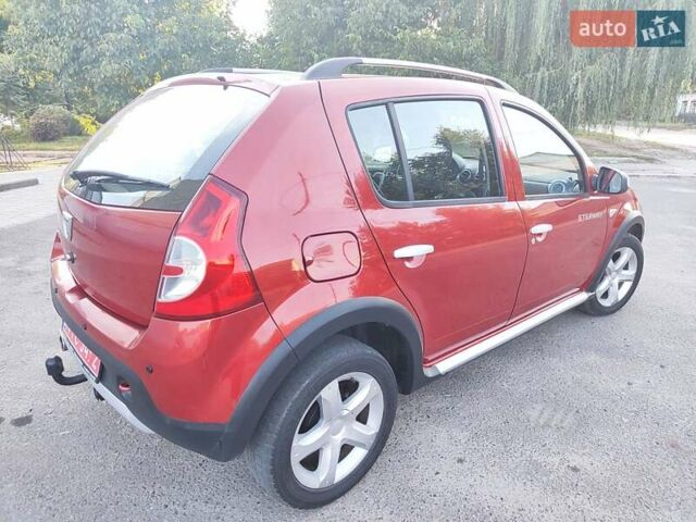 Красный Дачия Sandero StepWay, объемом двигателя 1.6 л и пробегом 157 тыс. км за 6650 $, фото 1 на Automoto.ua
