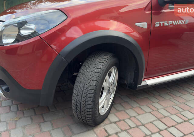 Красный Дачия Sandero StepWay, объемом двигателя 1.6 л и пробегом 71 тыс. км за 7349 $, фото 65 на Automoto.ua