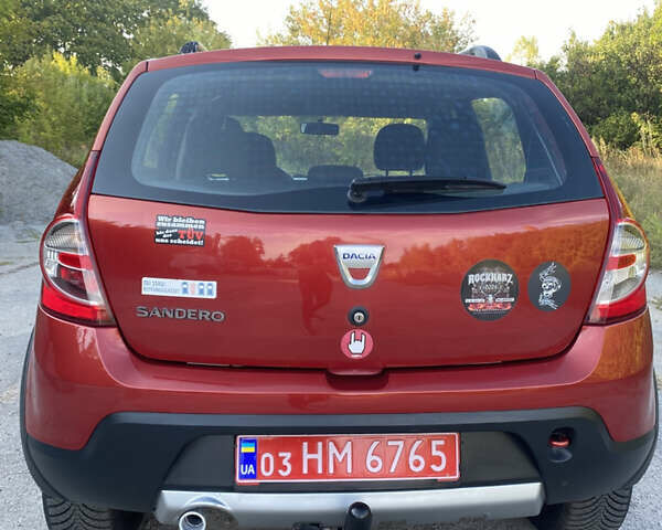 Красный Дачия Sandero StepWay, объемом двигателя 1.6 л и пробегом 174 тыс. км за 6700 $, фото 6 на Automoto.ua