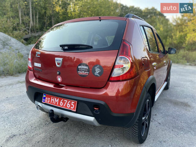 Красный Дачия Sandero StepWay, объемом двигателя 1.6 л и пробегом 174 тыс. км за 6700 $, фото 7 на Automoto.ua
