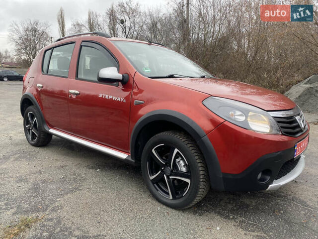 Красный Дачия Sandero StepWay, объемом двигателя 1.6 л и пробегом 179 тыс. км за 6700 $, фото 1 на Automoto.ua