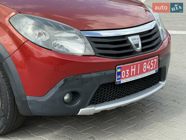Красный Дачия Sandero StepWay, объемом двигателя 1.6 л и пробегом 199 тыс. км за 6550 $, фото 12 на Automoto.ua