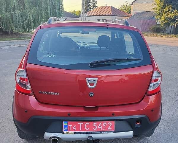 Дачия Sandero StepWay 2011 в Глухове на Automoto.ua Красный Дачия Sandero StepWay, объемом двигателя 1.6 л и пробегом 157 тыс. км за 6600 $, фото 7 на Automoto.ua