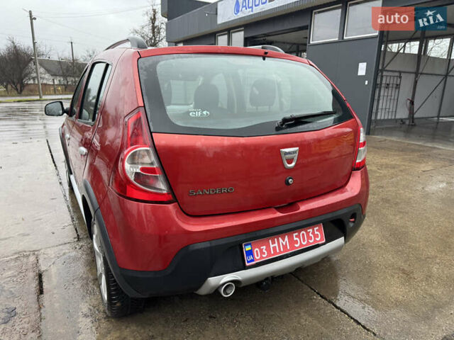 Красный Дачия Sandero StepWay, объемом двигателя 1.6 л и пробегом 185 тыс. км за 7350 $, фото 1 на Automoto.ua