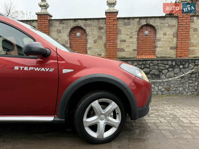 Красный Дачия Sandero StepWay, объемом двигателя 1.6 л и пробегом 163 тыс. км за 6950 $, фото 97 на Automoto.ua