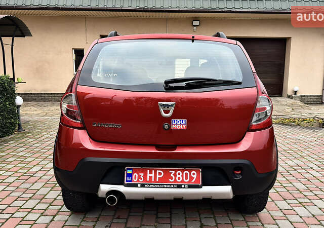 Красный Дачия Sandero StepWay, объемом двигателя 1.6 л и пробегом 115 тыс. км за 7599 $, фото 12 на Automoto.ua