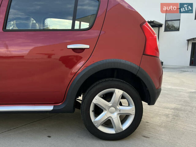 Красный Дачия Sandero StepWay, объемом двигателя 1.6 л и пробегом 139 тыс. км за 7350 $, фото 56 на Automoto.ua