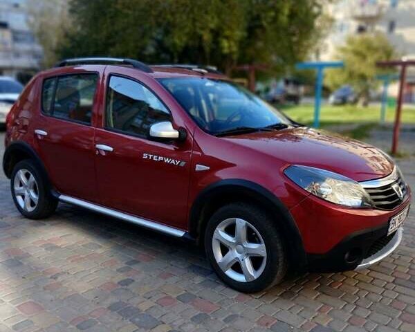 Красный Дачия Sandero StepWay, объемом двигателя 1.6 л и пробегом 135 тыс. км за 7200 $, фото 1 на Automoto.ua