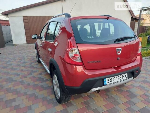 Красный Дачия Sandero StepWay, объемом двигателя 1.6 л и пробегом 128 тыс. км за 7400 $, фото 6 на Automoto.ua