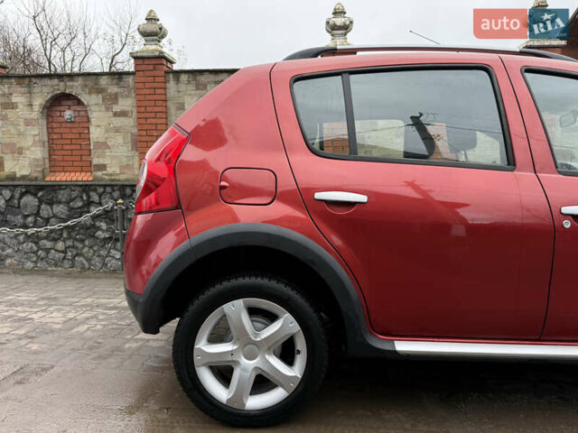 Красный Дачия Sandero StepWay, объемом двигателя 1.6 л и пробегом 163 тыс. км за 6950 $, фото 94 на Automoto.ua