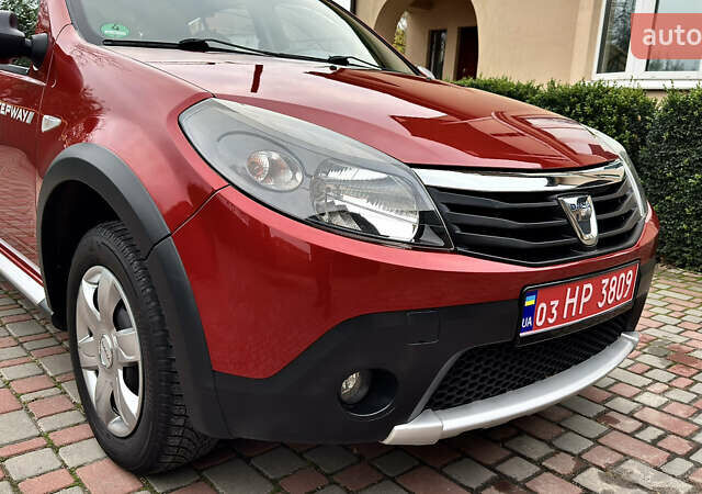 Красный Дачия Sandero StepWay, объемом двигателя 1.6 л и пробегом 115 тыс. км за 7599 $, фото 24 на Automoto.ua