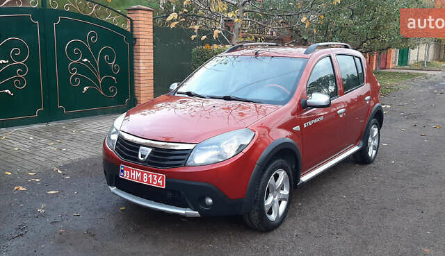 Красный Дачия Sandero StepWay, объемом двигателя 1.6 л и пробегом 183 тыс. км за 6850 $, фото 4 на Automoto.ua