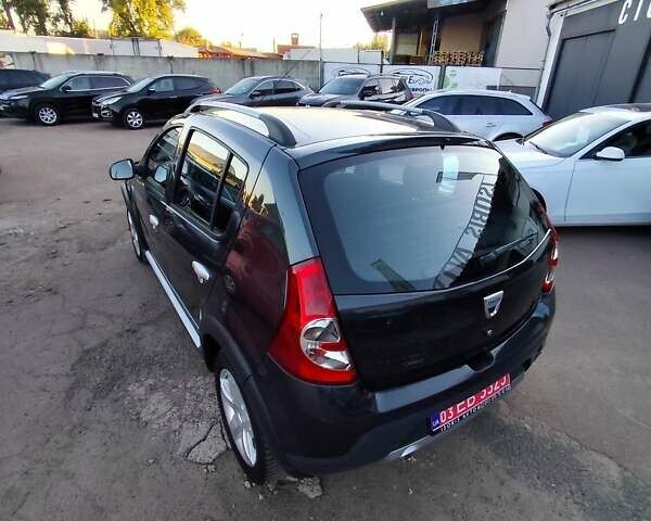 Серый Дачия Sandero StepWay, объемом двигателя 1.6 л и пробегом 190 тыс. км за 6600 $, фото 18 на Automoto.ua