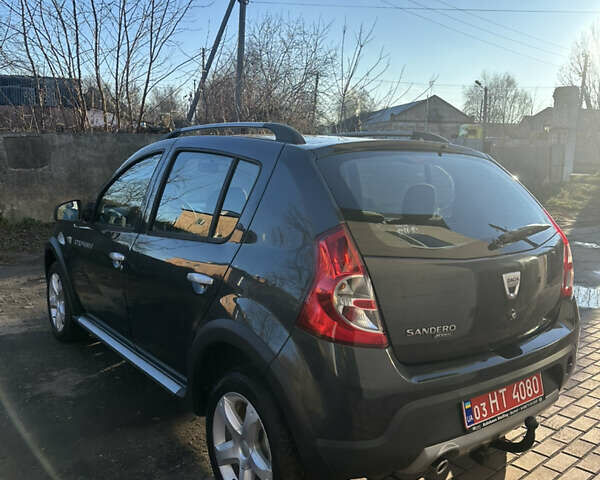 Серый Дачия Sandero StepWay, объемом двигателя 1.6 л и пробегом 180 тыс. км за 6699 $, фото 5 на Automoto.ua