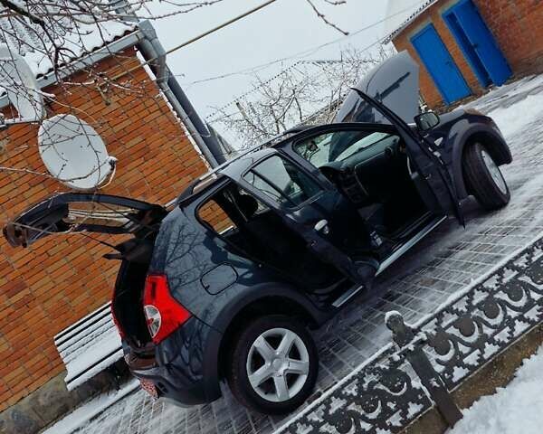 Серый Дачия Sandero StepWay, объемом двигателя 1.6 л и пробегом 172 тыс. км за 6650 $, фото 128 на Automoto.ua