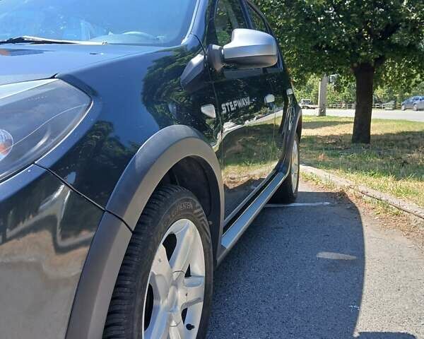 Серый Дачия Sandero StepWay, объемом двигателя 1.6 л и пробегом 207 тыс. км за 6600 $, фото 14 на Automoto.ua