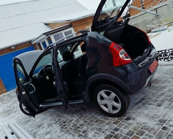 Серый Дачия Sandero StepWay, объемом двигателя 1.6 л и пробегом 172 тыс. км за 6650 $, фото 126 на Automoto.ua