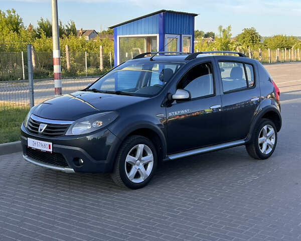 Серый Дачия Sandero StepWay, объемом двигателя 1.6 л и пробегом 124 тыс. км за 6100 $, фото 9 на Automoto.ua