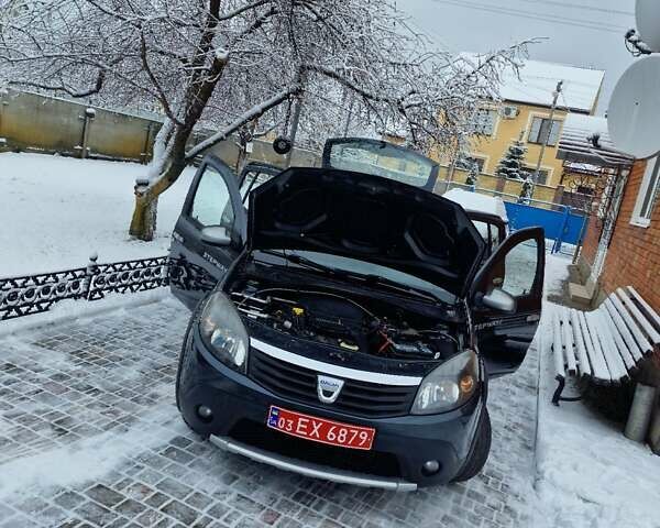 Серый Дачия Sandero StepWay, объемом двигателя 1.6 л и пробегом 172 тыс. км за 6650 $, фото 124 на Automoto.ua