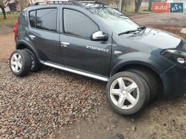 Серый Дачия Sandero StepWay, объемом двигателя 1.6 л и пробегом 133 тыс. км за 6800 $, фото 44 на Automoto.ua