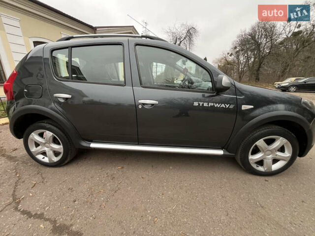 Серый Дачия Sandero StepWay, объемом двигателя 1.6 л и пробегом 60 тыс. км за 6999 $, фото 133 на Automoto.ua